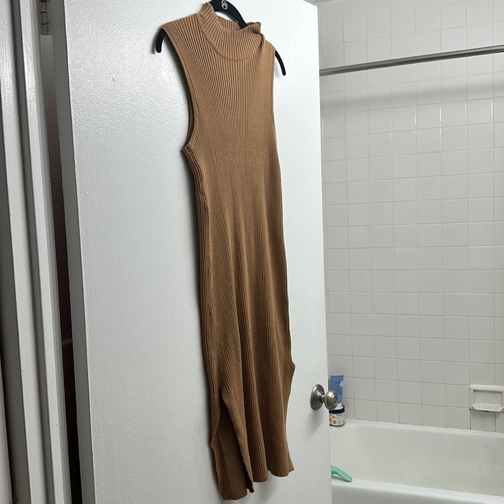 Sleeveless mock neck sweater dress with side slit